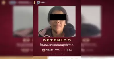 Mujer con un arma en la va pblica