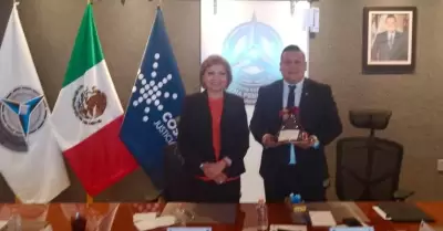 comisionada Ma. Elena Andrade Ram�rez intercambi� con Gustavo L�pez Acosta