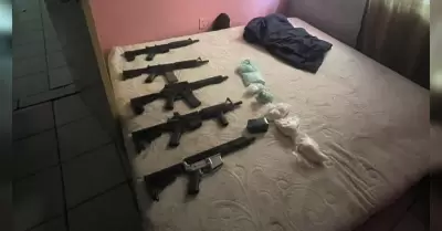 5 armas largas y droga