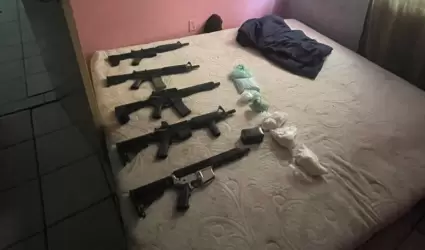 5 armas largas y droga