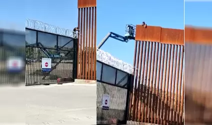 Hombre trepado en el muro