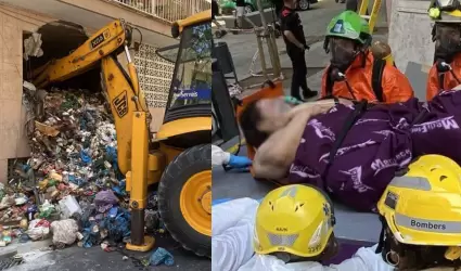 Hombre siendo rescatado