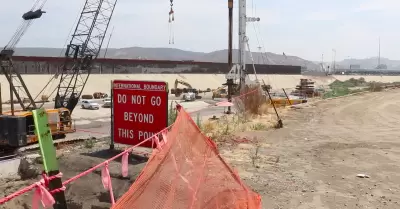 Construccin de muro fronterizo en canalizacin del Ro Tijuana