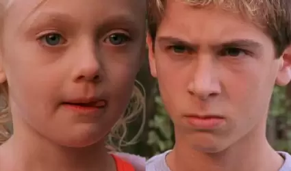 Dakota Fanning tambi�n se ha destacado como modelo, profesi�n en la que se intro