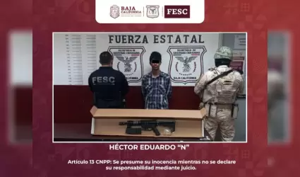 Sujeto con arma de fuego de alto calibre