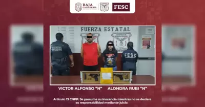 Detiene a hombre y mujer armados