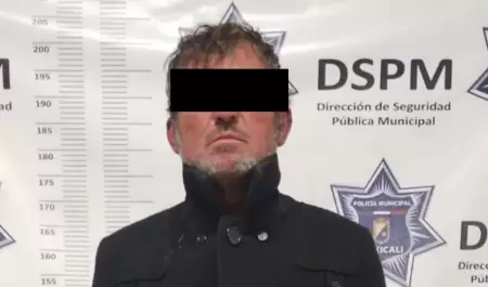 Detienen a hombre con arma prohibida y orden de aprehensin activa por robo