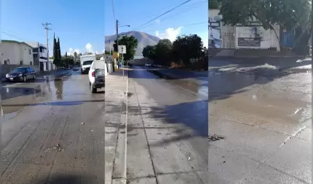 Vecinos denuncian aguas negras y bache en la calle Esperanza del fraccionamiento