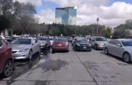 Congestin vial por estacionamiento de estudiantes en carriles de acceso a Va Rpida