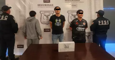 Asegurados en posesin de un arma corta en Tijuana