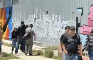 VIDEO: Muro de la frontera se llena de rostros; madres buscadoras lo transforman en memorial de desaparecidos
