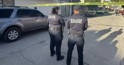 Polica muere tras dispararse