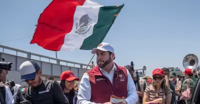 Presentacin del billete de Lotera Nacional en honor a la comunidad migrante