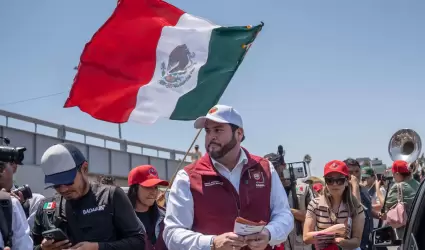 Presentacin del billete de Lotera Nacional en honor a la comunidad migrante