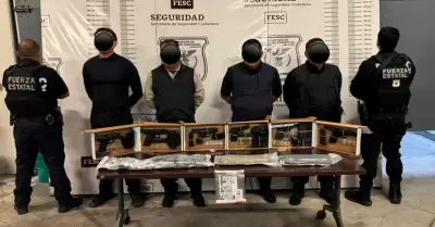 Detienen a falsos escoltas con arsenal en Tijuana