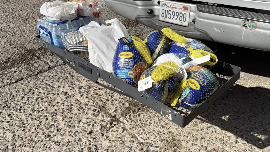 Activistas migrantes comparten cena de "Accin de Gracias" a deportados