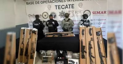Aseguran 13 armas largas y m�s de mil cartuchos en operativos en Tecate