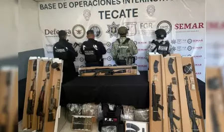 Aseguran 13 armas largas y m�s de mil cartuchos en operativos en Tecate