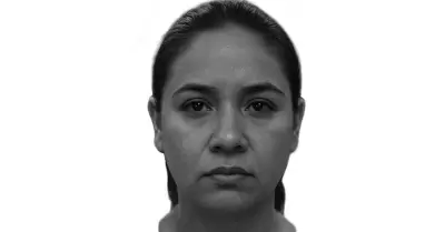 Buscan identificar a mujer hallada sin vida