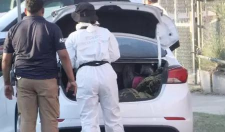 Cuatro cad�veres con huellas de violencia abandonados en veh�culos desatan alert