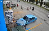 Empleado corre y salva a ni�a que escap� hacia la avenida en Puebla