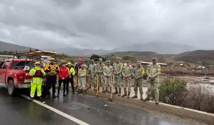 Contin�a b�squeda de 3 personas presuntamente arrastradas por corriente del arro