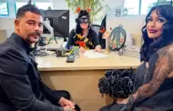 Las parejas se dicen "I Boo" durante la ceremonia anual de Halloween del condado